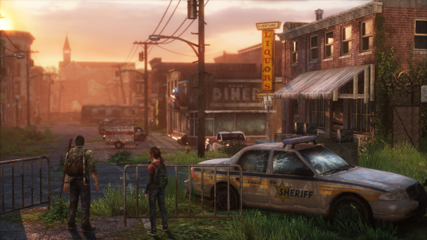 joel-y-ellie-last-of-us-ciudad-en-ruinas-atardecer